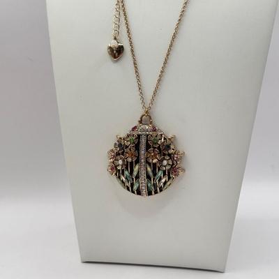 LOT 339J: Betsey Johnson Gold Tone Ladybug Pendant Necklace (32.5”)