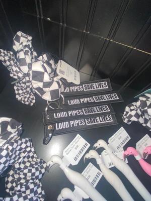 NOVELTY ITEMS, FLAMINGO PENS, ROSIE THE RIVETER KEYCHAINS & DECALS, HAIR SCRUNCHIES, LOUD PIPE KEY CHAINS