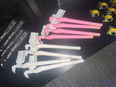 NOVELTY ITEMS, FLAMINGO PENS, ROSIE THE RIVETER KEYCHAINS & DECALS, HAIR SCRUNCHIES, LOUD PIPE KEY CHAINS