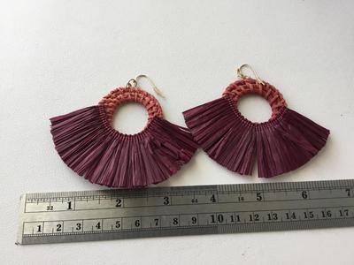 Red statement earrings