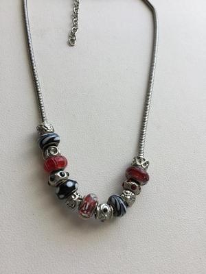 Beautiful unmarked red and black beaded fashion necklace