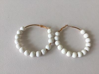 White beaded hoop earrings