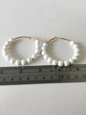 White beaded hoop earrings