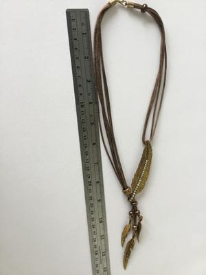 Gold tone multi strand leaf necklace