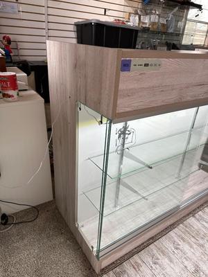 RETAIL CHECKOUT COUNTER WITH LIGHTED DISPLAY CASE