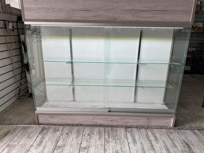 RETAIL CHECKOUT COUNTER WITH LIGHTED DISPLAY CASE
