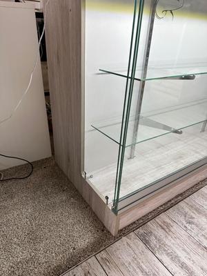 RETAIL CHECKOUT COUNTER WITH LIGHTED DISPLAY CASE