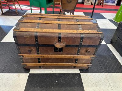ANTIQUE WOODEN TRUNK WITH IRON ACCENTS