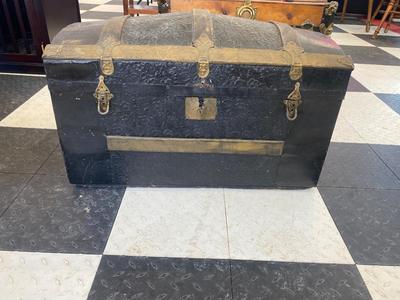 ANTIQUE TRUNK WITH BRASS ACCENTS
