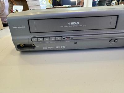 MAGNAVOX COMBO VHS/DVD PLAYER, TELEPHONE AND A SMALL BLUETOOTH RADIO