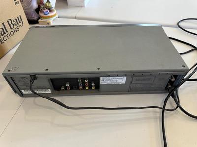 MAGNAVOX COMBO VHS/DVD PLAYER, TELEPHONE AND A SMALL BLUETOOTH RADIO