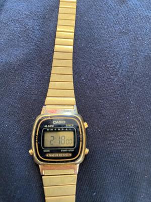 GOLD TONE COSTUME JEWELRY, AND MEN’S ELGIN WATCH.