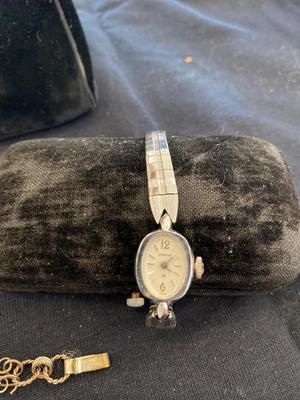 PARAY CLUTCH, WIND UP WATCH, BROOCH, CHOKER, AND EARRINGS