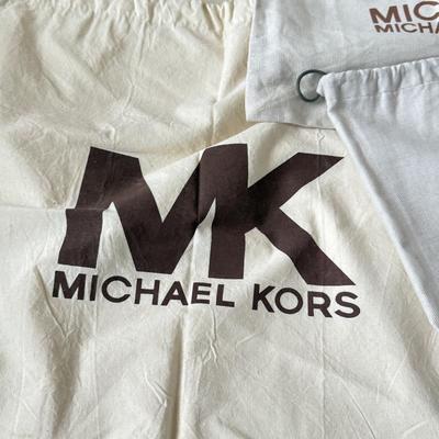 LOT 413L: Collection of Designer Bag Dust Covers: Michael Kors, Coach, Betsey Johnson, Dooney & Bourke