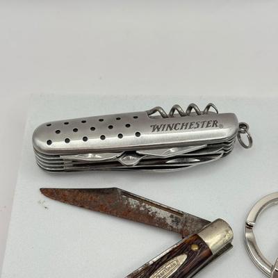 LOT 324J: Arrow Pen & Collection of Pocket Knives: Swiss, Winchester & Craftsman