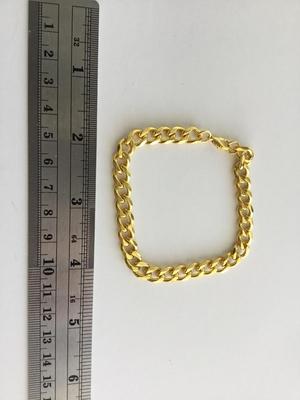Gold tone chain link type fashion unmarked bracelet