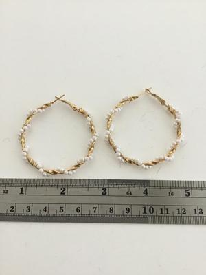 Gold tone faux beaded hoop earrings