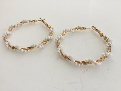 Gold tone faux beaded hoop earrings
