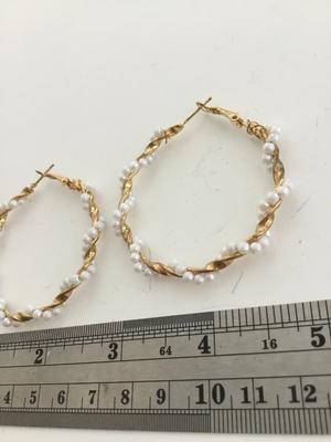 Gold tone faux beaded hoop earrings