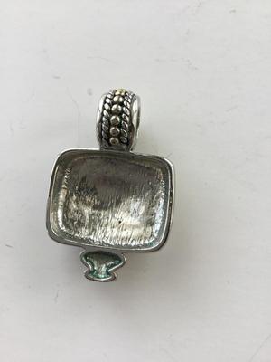 Silver tone necklace pendant