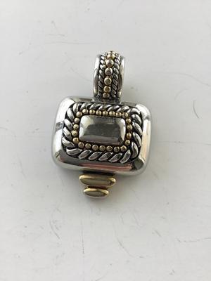 Silver tone necklace pendant