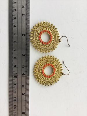 Gold tone round statement earrings