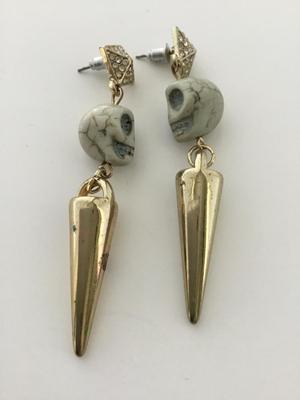 Gold tone skull fashion dangle earrings