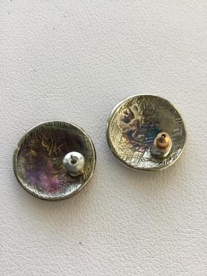 Beautiful enamel type round earrings