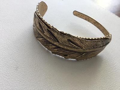 Gold tone leaf cuff bracelet
