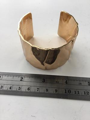 Gold tone fashion cuff