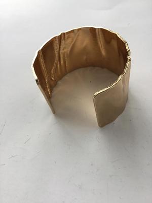 Gold tone fashion cuff