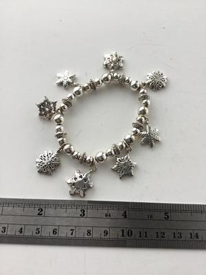 Snowflake charm stretchy beaded bracelet