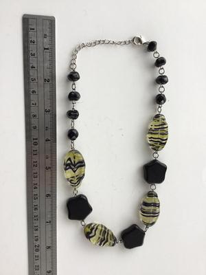 Unmarked black and green statement necklace
