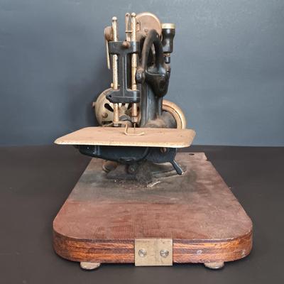 LOT 196: Antique Willcox & Gibbs Sewing Machine