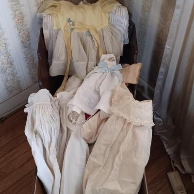 LOT 205: Vintage Baby Clothes, Wooden Cradle & More