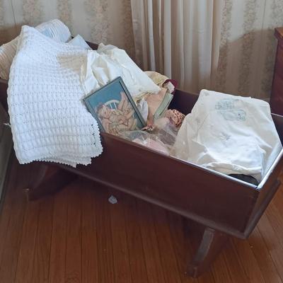 LOT 205: Vintage Baby Clothes, Wooden Cradle & More
