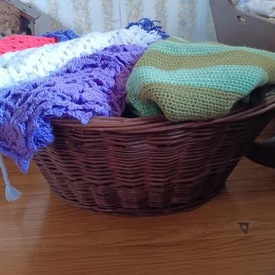 LOT 206: Vintage Crocheted Wraps, Ponchos, Capes in a Large Basket