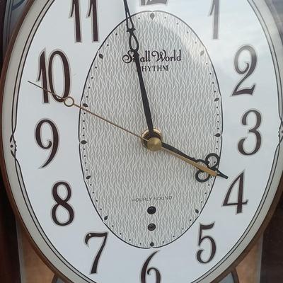 LOT 224: Pair of Floor Lamps with Small World Rhythm Clock