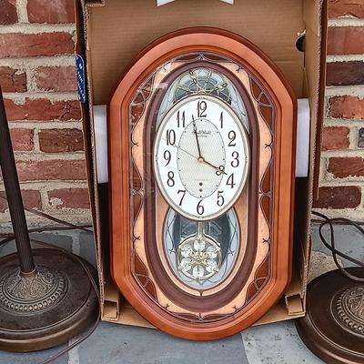 LOT 224: Pair of Floor Lamps with Small World Rhythm Clock