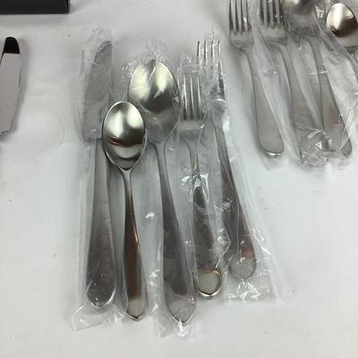 K829 Set of ROBERT WELCH Stainless Steel " Flute" Flatware