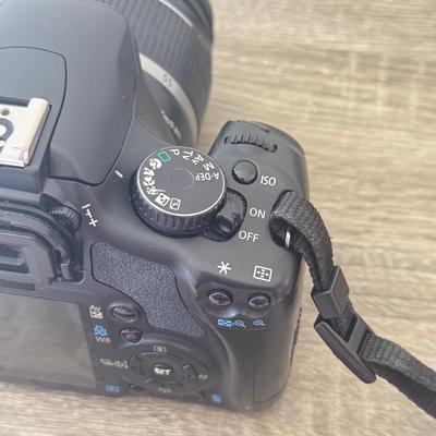 LOT 81K: Canon EOS Rebel XSI DSLR Camera Body w/ Attatched Lens, Manual & Battery Charger
