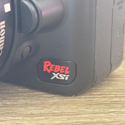 LOT 81K: Canon EOS Rebel XSI DSLR Camera Body w/ Attatched Lens, Manual & Battery Charger