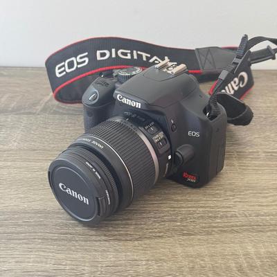 LOT 81K: Canon EOS Rebel XSI DSLR Camera Body w/ Attatched Lens, Manual & Battery Charger