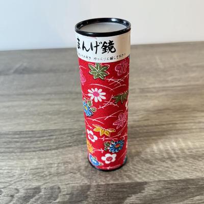 LOT 142K: MC Escher Kaleidocycles Book & Collection of Kaleidoscopes