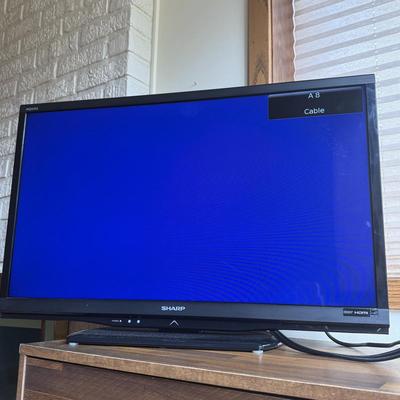 LOT 158F: Sharp 32” LCD TV Model LC-32LE450U