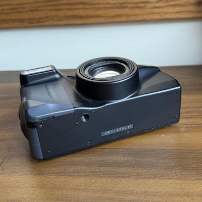 LOT 198X: Ricoh Shot Master Zoom 105 Camera, Nikon National Geographic Society Binoculars, Canon Camera Bag, Unused 35mm Film & More