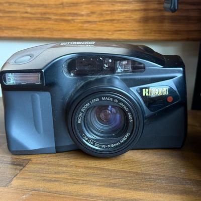 LOT 198X: Ricoh Shot Master Zoom 105 Camera, Nikon National Geographic Society Binoculars, Canon Camera Bag, Unused 35mm Film & More