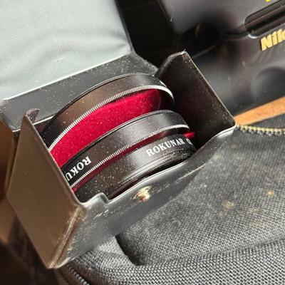 LOT 198X: Ricoh Shot Master Zoom 105 Camera, Nikon National Geographic Society Binoculars, Canon Camera Bag, Unused 35mm Film & More