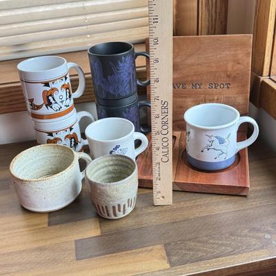 LOT 221K: Signed Stoneware Pottery Mug, Black & Indigo Flower Garden Mug Pair, “Save my Spot” Tray & More