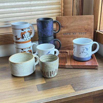 LOT 221K: Signed Stoneware Pottery Mug, Black & Indigo Flower Garden Mug Pair, “Save my Spot” Tray & More